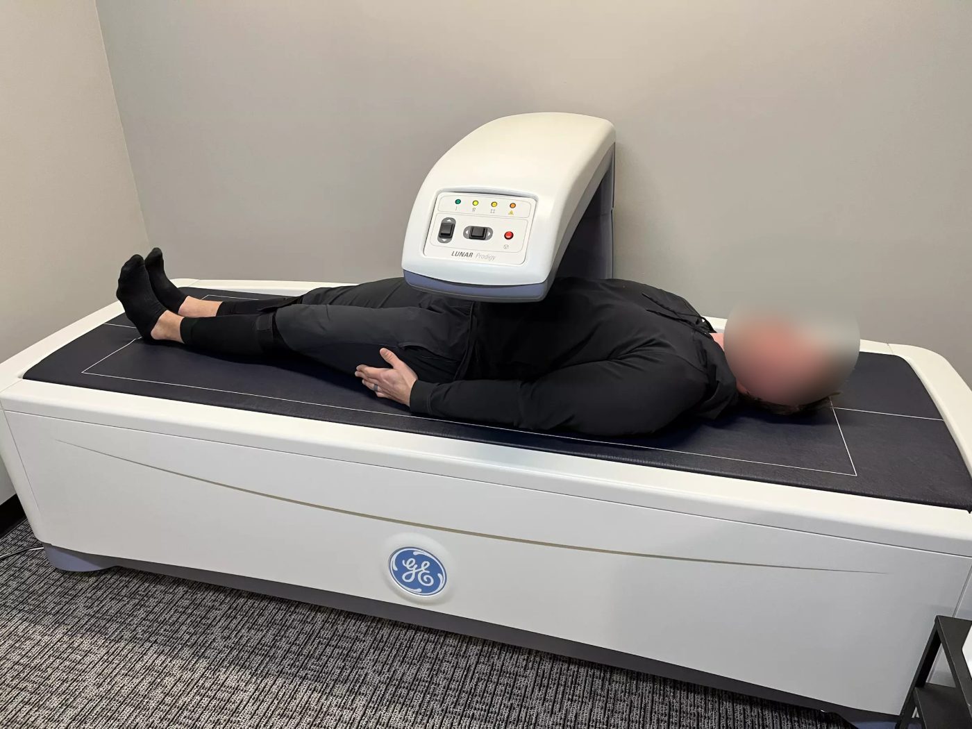 A person undergoing a DEXA body-composition scan